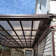 Навес перед домом из стеклопластиковог шифера ИталПласт бронза